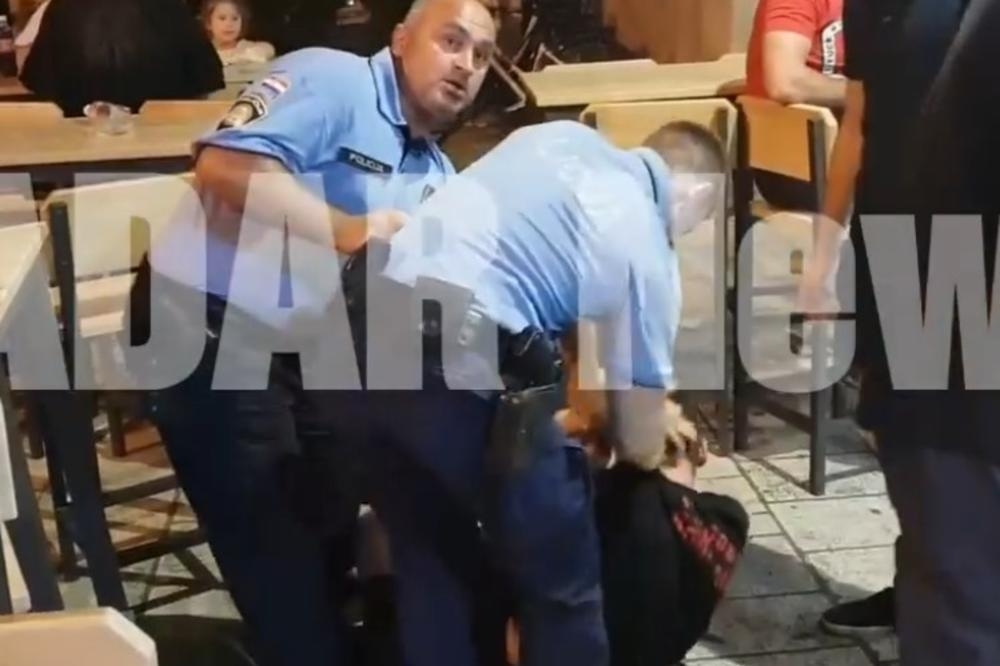 VIDEO – Bahato ponašanje hrvatske policije: Zbog glasne muzike radnika restorana oborili na pod, pa ga uhapsili, a kasnije se vratili i po konobaricu